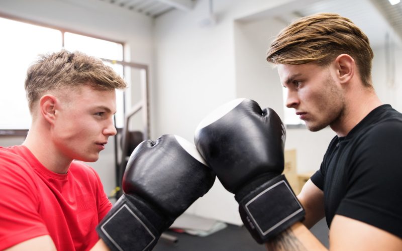two-fit-handsome-men-in-gym-boxing-.jpg